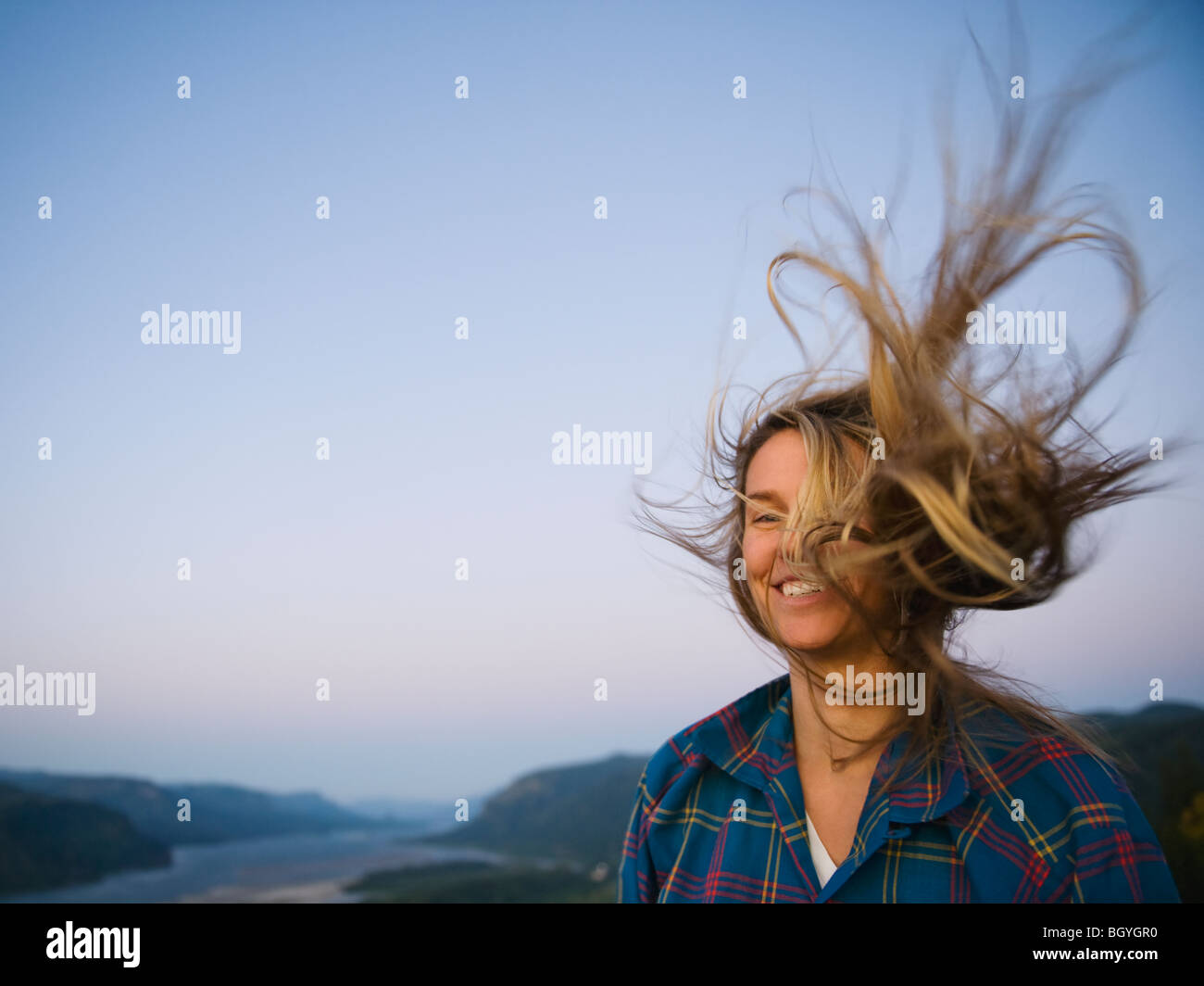 Wind blowing blonde hair woman beach hires stock photography and