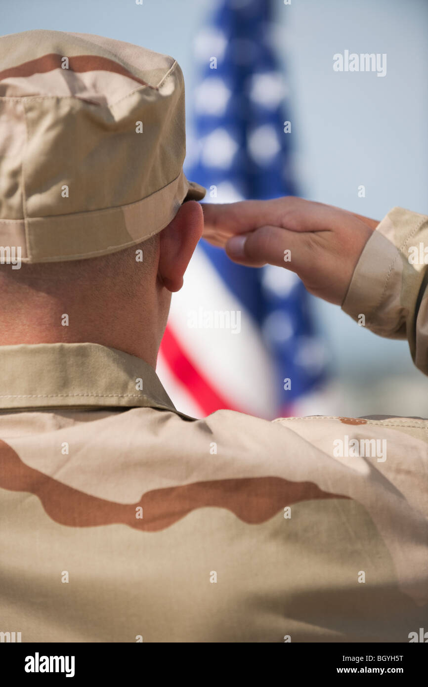 Soldier saluting Stock Photo