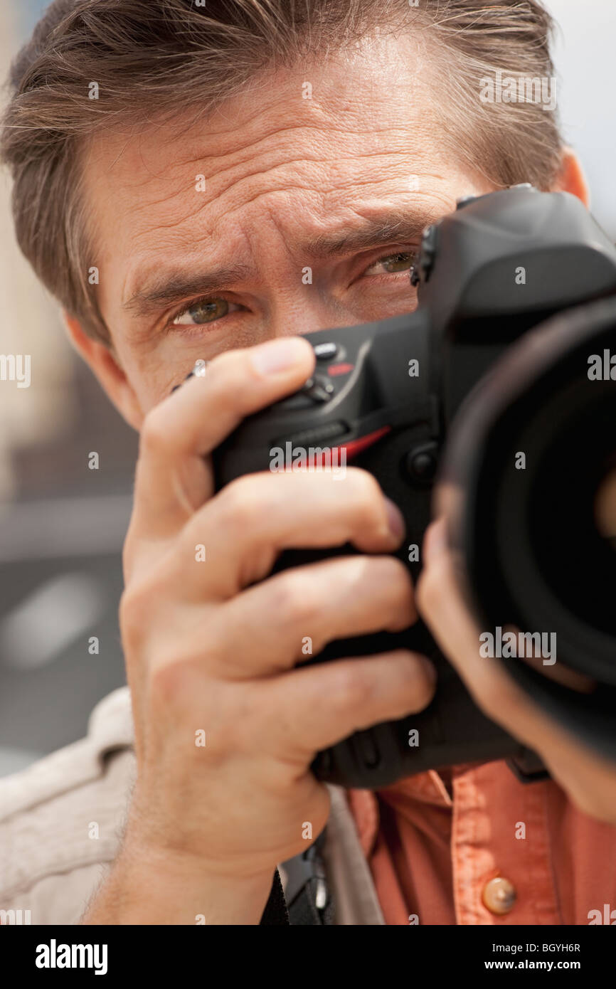 Man taking picture Stock Photo