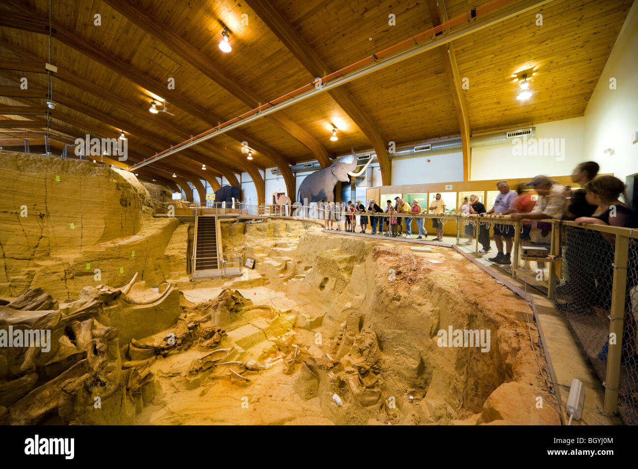 The Mammoth Site Museum, Hot Springs SD. Visitors looking into the