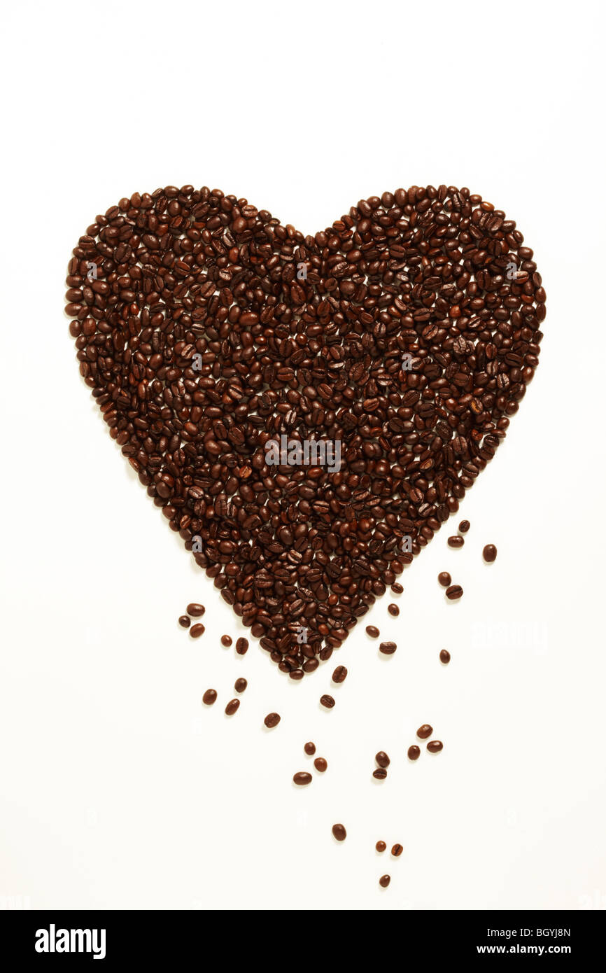 Coffee Beans Foaming a Heart Shape Symbolizing Love Stock Photo Alamy