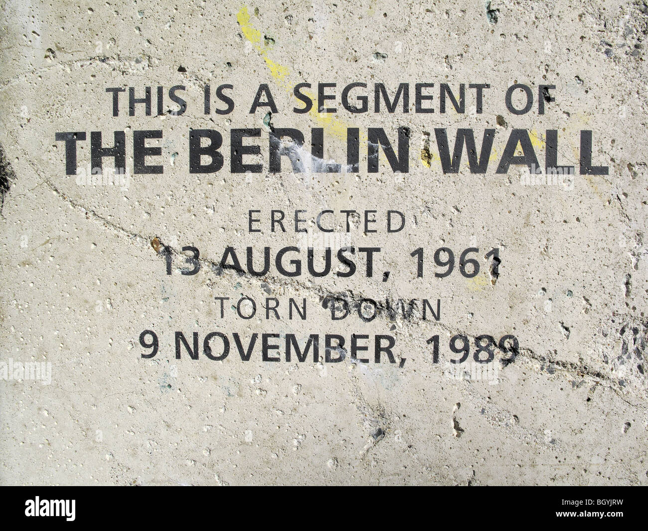 caption on a large section of the Berlin Wall erected as a display Stock Photo