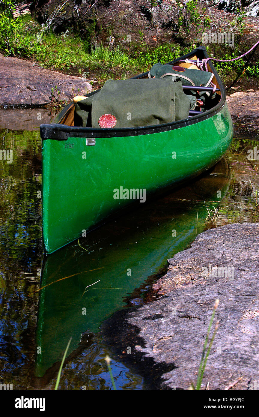 Loaded canoe in the Boundary Waters Canoe Area WIlderness Stock Photo