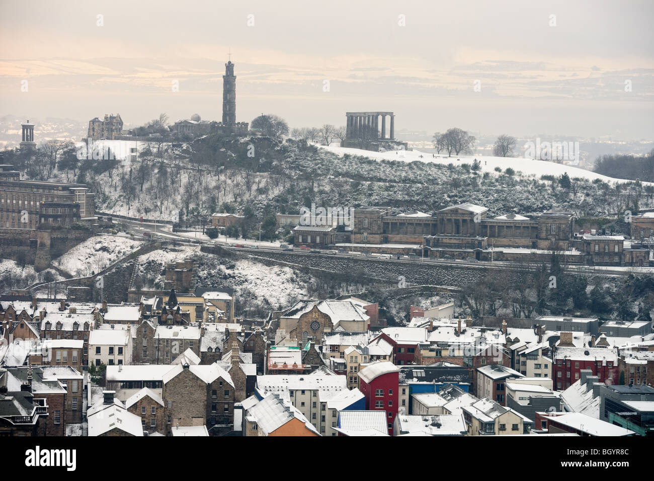 Calton Hill, Edinburgh, Scotland, UK, from the south, in the snow. Fife is just visible across the Firth of Forth. Stock Photo