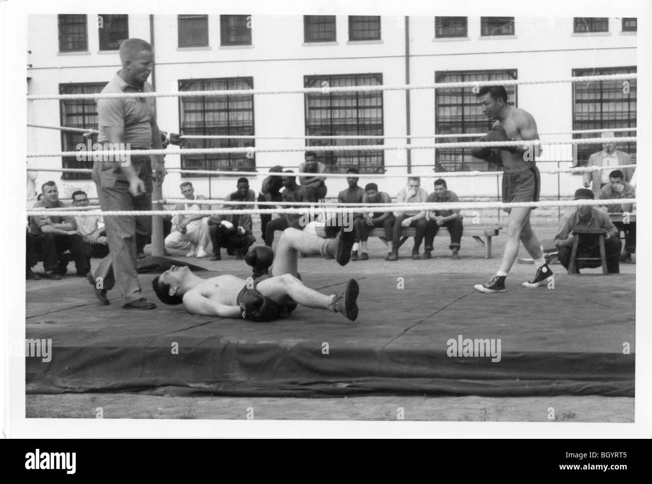 Boxing ring on yard inside prison. Recreational games. Approx 19401950