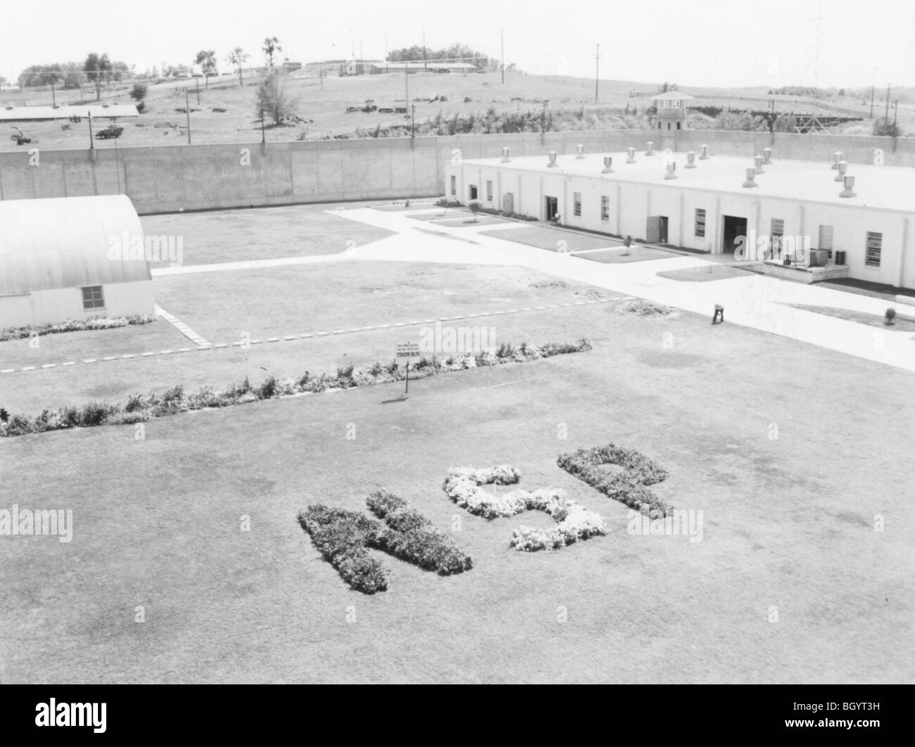 Flower planting in prison yard spelling out NSP, for Nebraska State Penitentiary. Lincoln, Nebraska, USA. Stock Photo