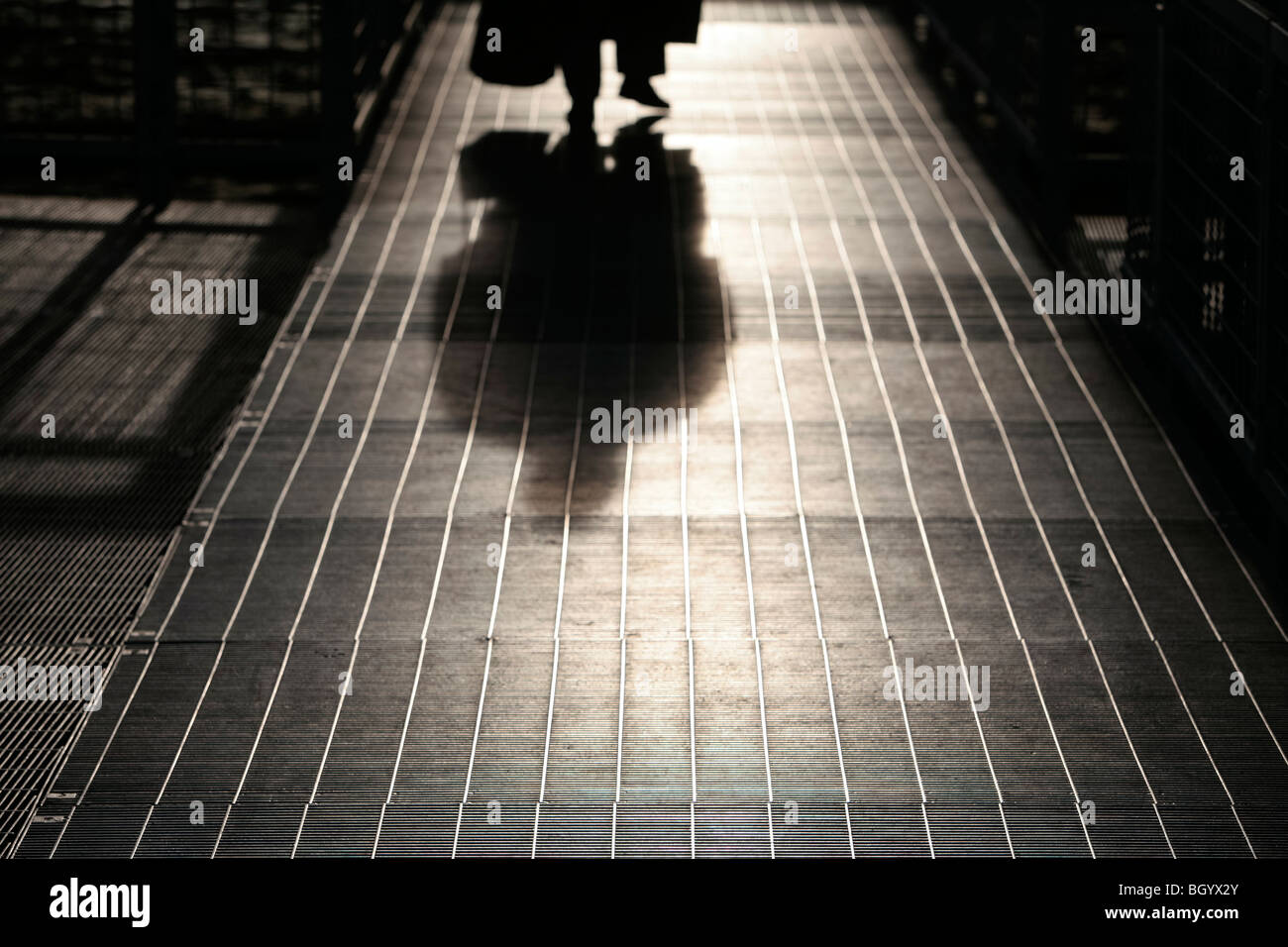 An industrial metal grid walkway background Stock Photo