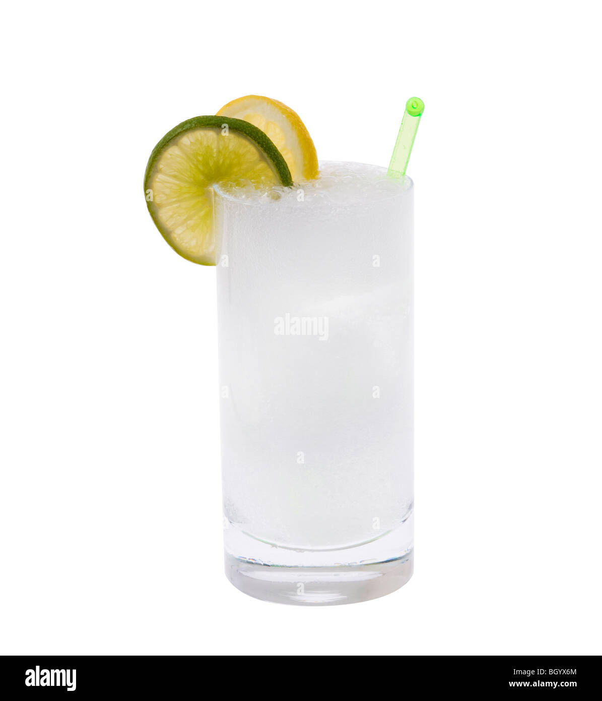 Vodka or Gin & Tonic mixed drink with lemon/line slice garnish on white background Stock Photo