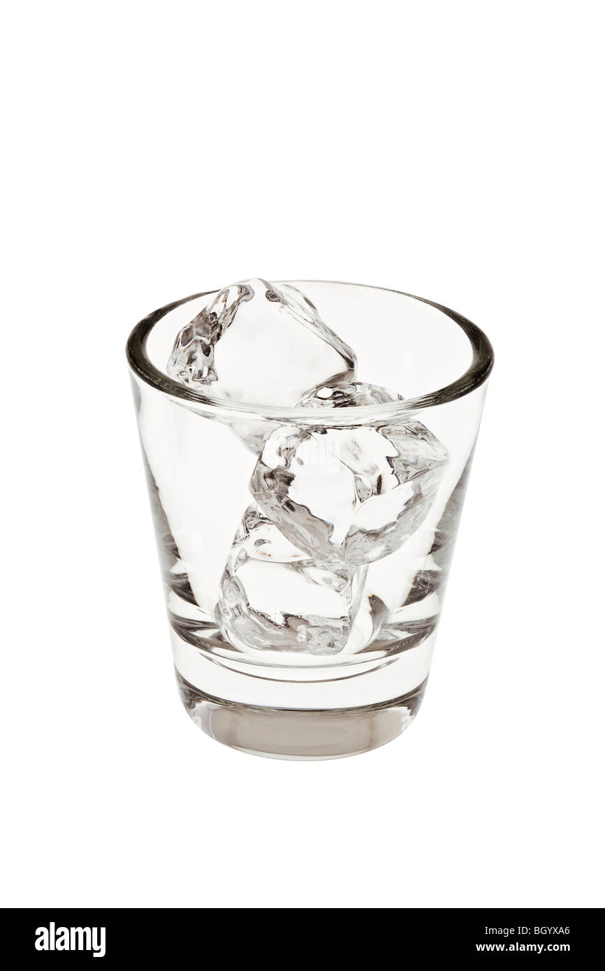Empty old fashioned glass with ice cubes on a white background on a