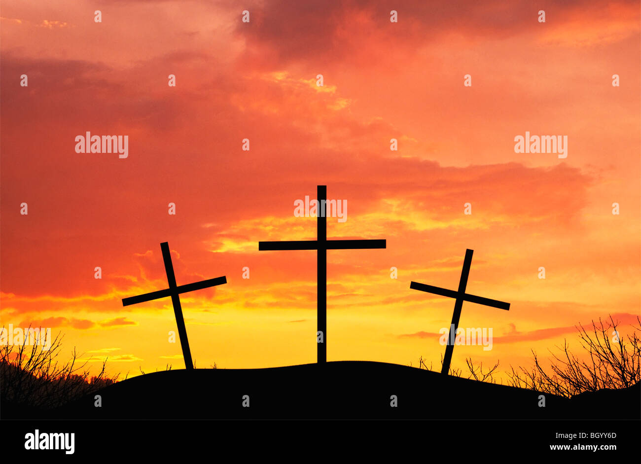 Three crosses on top of hill Stock Photo
