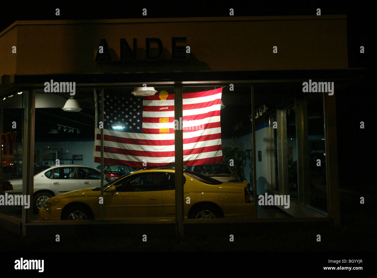 The American flag is used to help sell cars in Lawrenceburg, Indiana