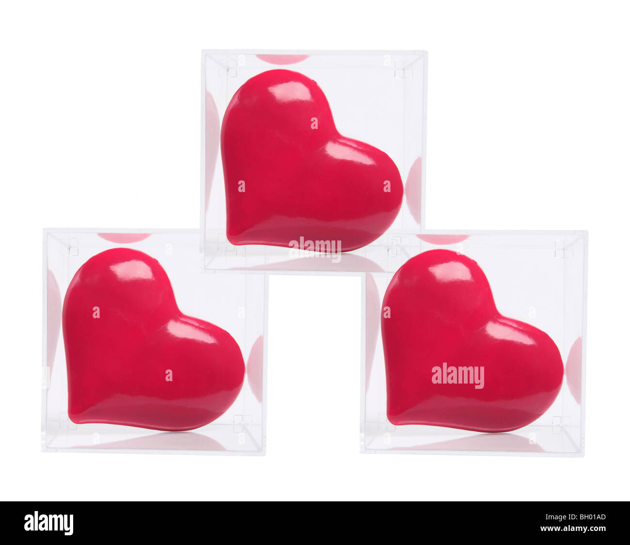 Red Love Hearts in Plastic Boxes Stock Photo