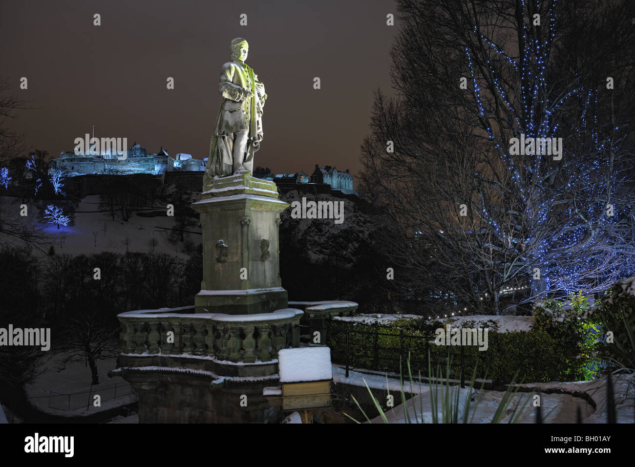 Statue of the Scottish poet Allan Ramsay, Princes Street Gardens, Edinburgh,Scotland,UK. Edinburgh Castle is in the background. Stock Photo