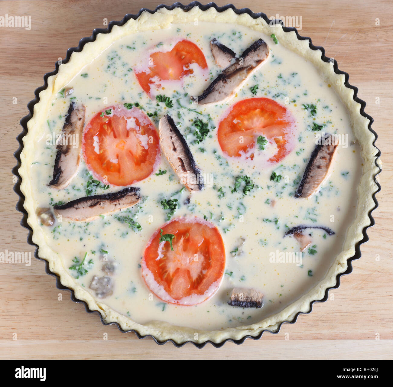 An ovenready quiche viewed from above Stock Photo Alamy