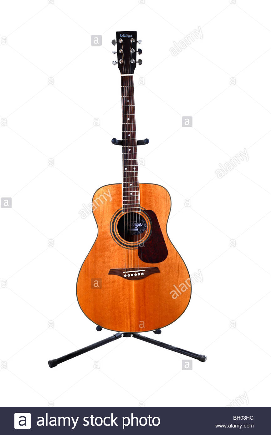 Acoustic guitar on stand Stock Photo