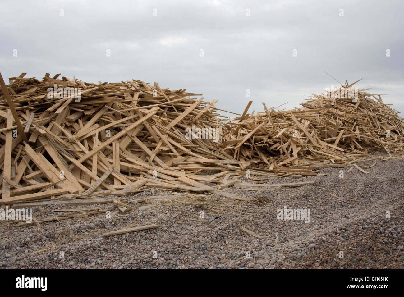 Timber Ship Stack Stacks of timber washed up on Worthing beach after ship wreck Stock ...