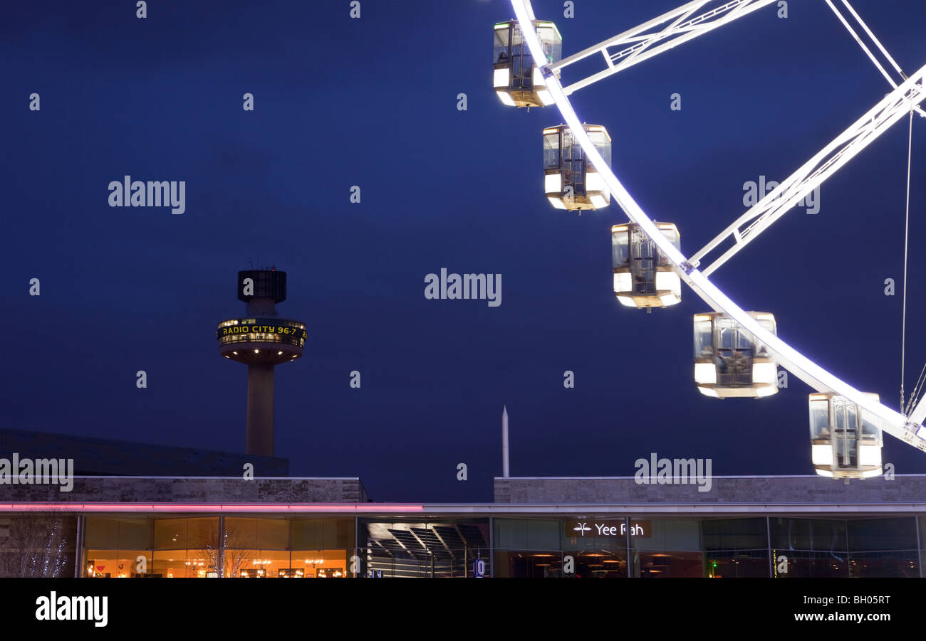 Liverpool, Merseyside, England, UK, Europe. Liverpool One wheel and Radio City 96.7 tower at night Stock Photo