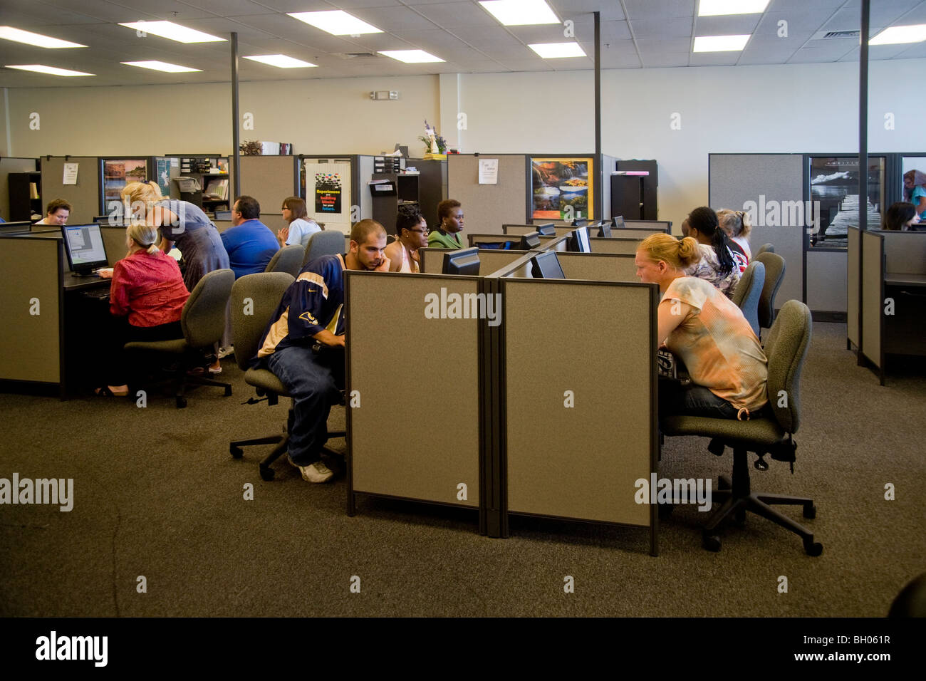 Out-of-work auto industry employees seek alternative unemployment at a state-run job search facility in Warren, Michigan. Stock Photo