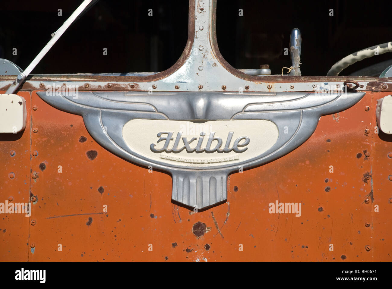 An old abandoned 'Flxible' bus sits silently outside of Carrizozo, New Mexico. Stock Photo