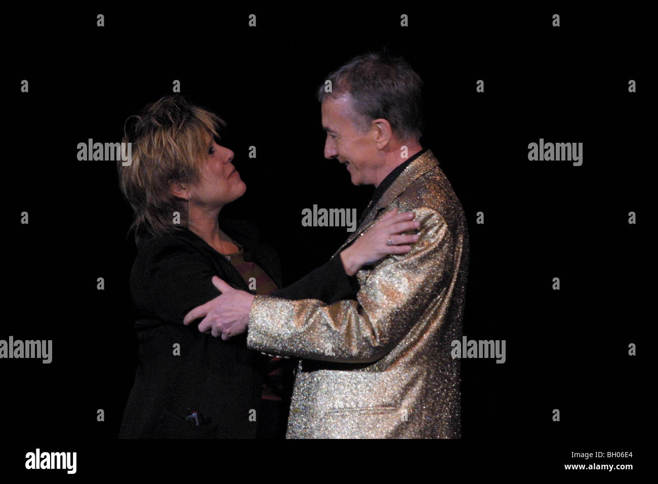 Carrie Fisher, left, who played Princess Leia in the original Star Wars movies embraces Anthony Daniels who plays C3PO Stock Photo