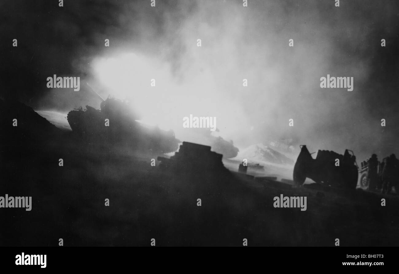 'Dog' Company, 1st Tank Battalion, cut with their 90mm guns during night firing at enemy position in front of First Marine Div Stock Photo