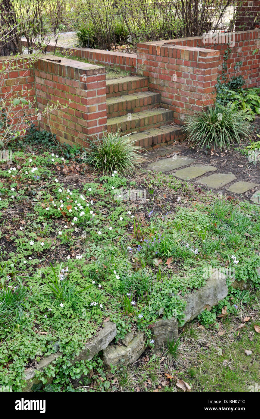 Spring garden with brick staircase Stock Photo