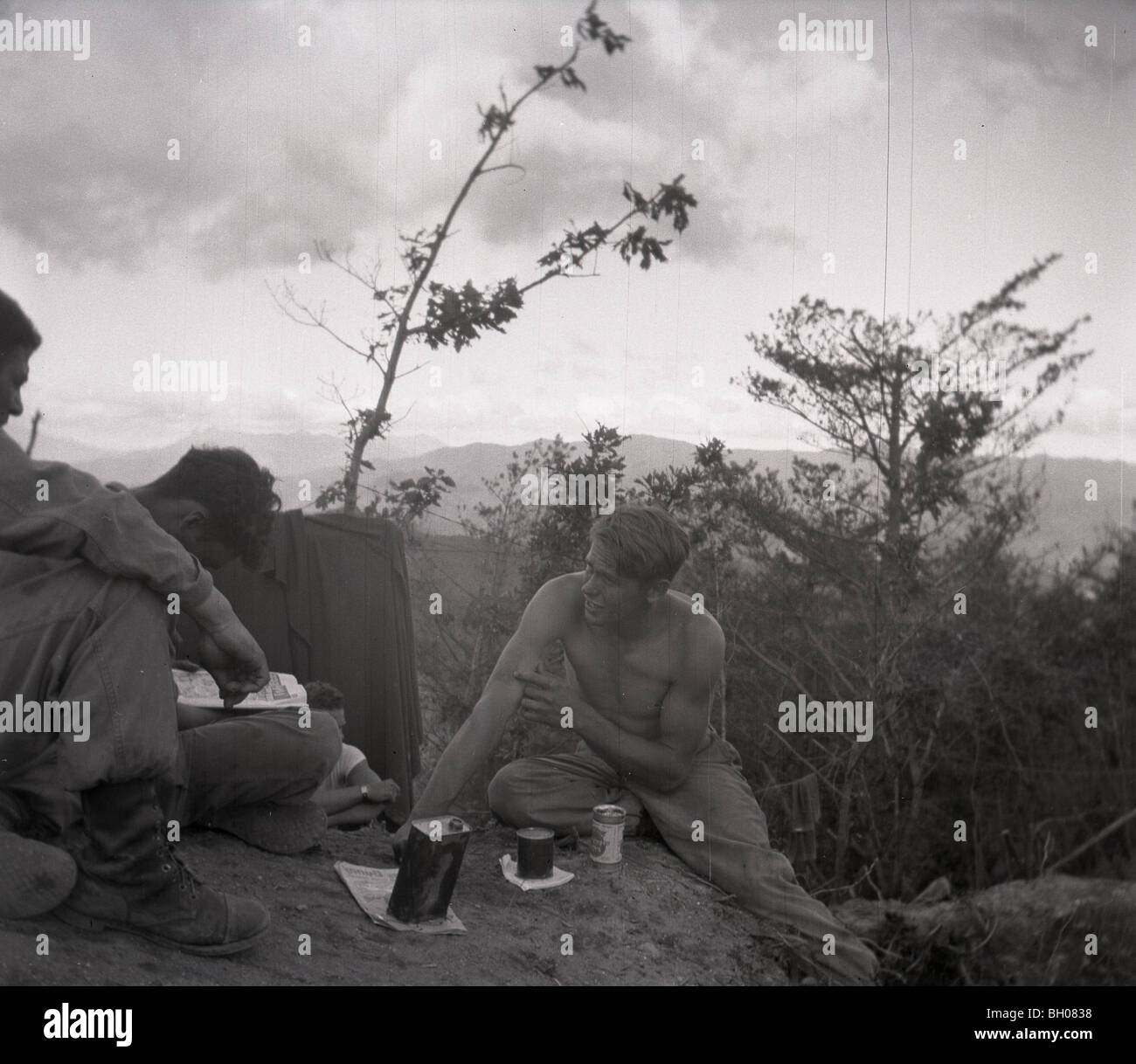 Soldiers of the Second Infantry Division take a moment to relax during the Korean War. Stock Photo