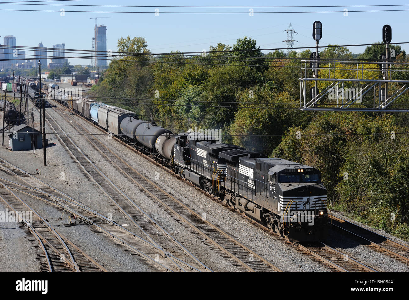 A typical American freight train passes through Charlotte, North Carolina. These trains can be longer than a mile long. Stock Photo