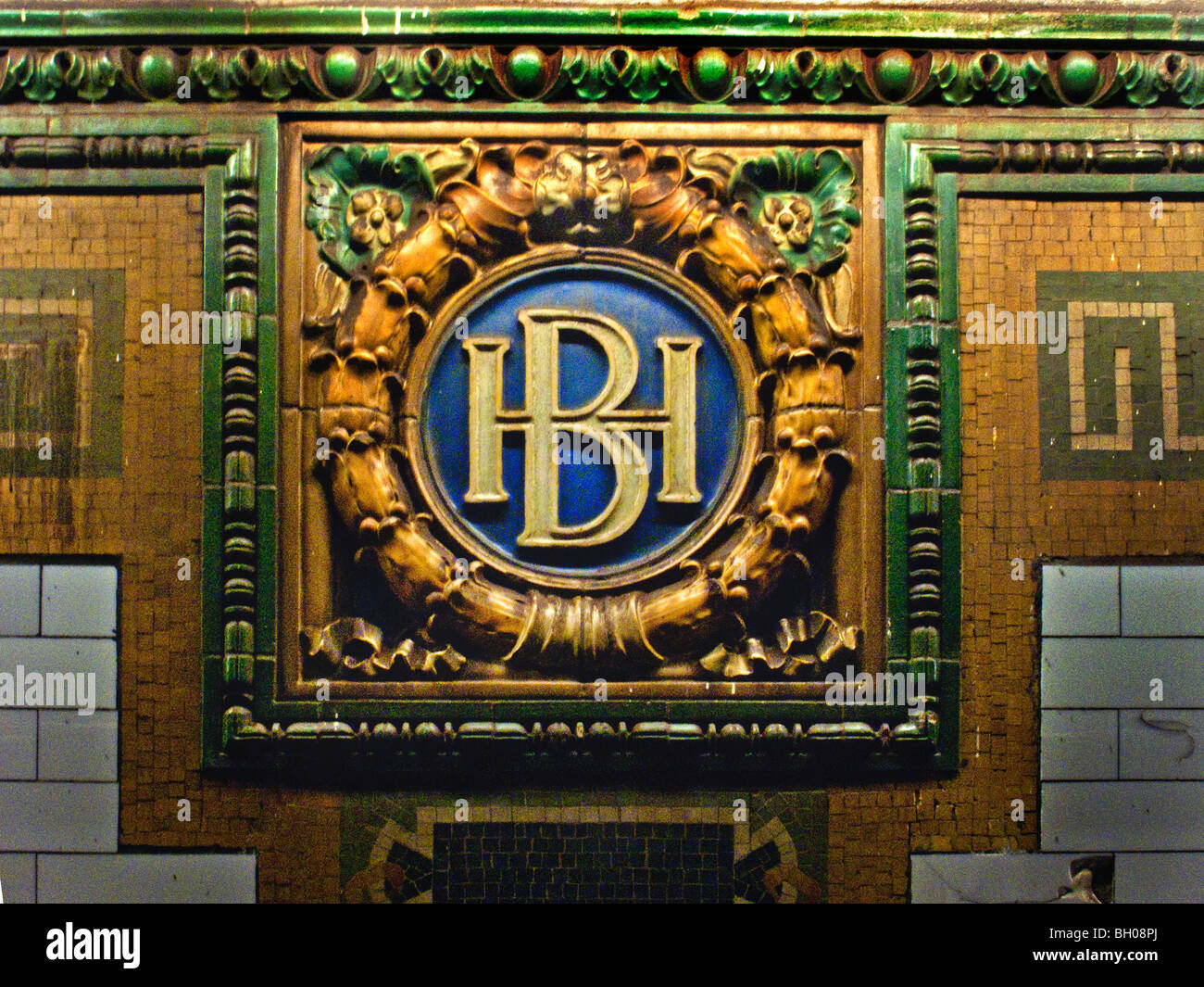 An elegant Beaux-Art ceramic bas relief station identification sign at the Borough Hall New York City subway station. Stock Photo