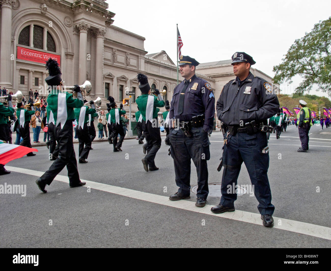 Policemen on duty at the Columbus Day parade in New York City watch ...