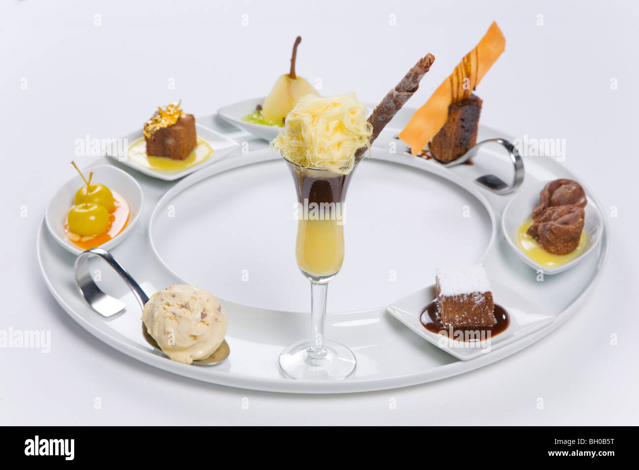 assorted desserts on circular tray Stock Photo