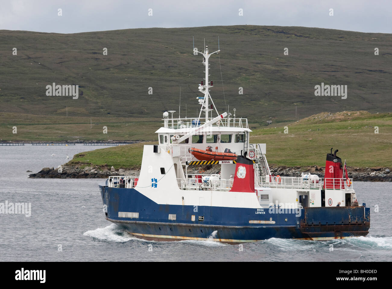 The local Shetland ferry Bigga at the Bluemull Sound. Stock Photo