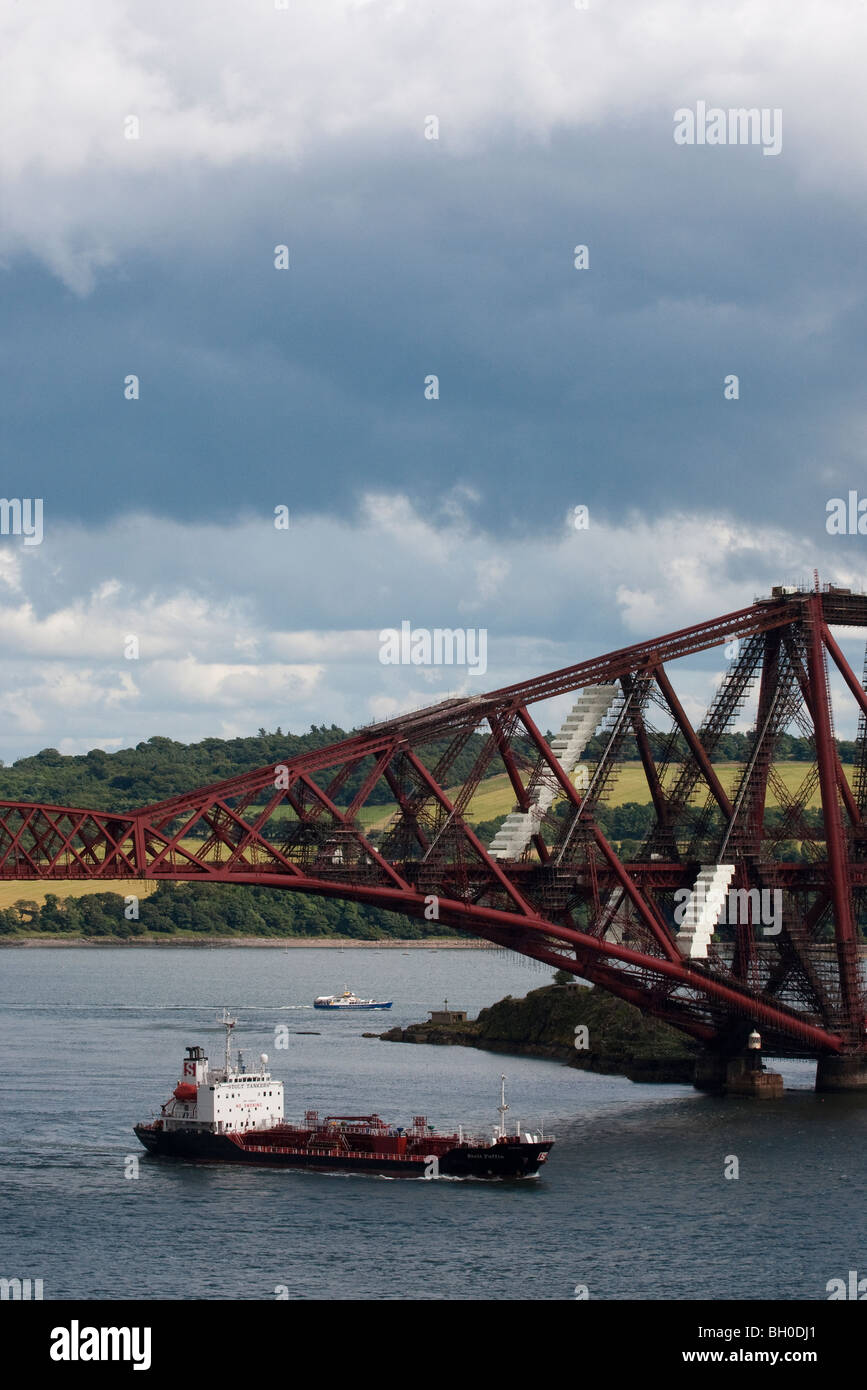 The Stolt Tankers Stolt Puffin passing under the Forth Railway Bridge. Stock Photo
