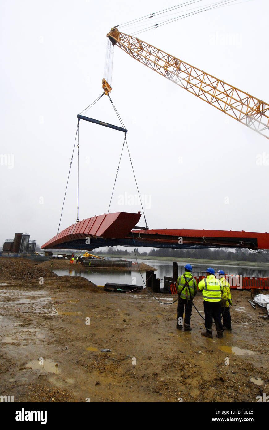 Eton College Dorney lake Rowing Centre new bridge being lowered into place on the widened return channel. Stock Photo