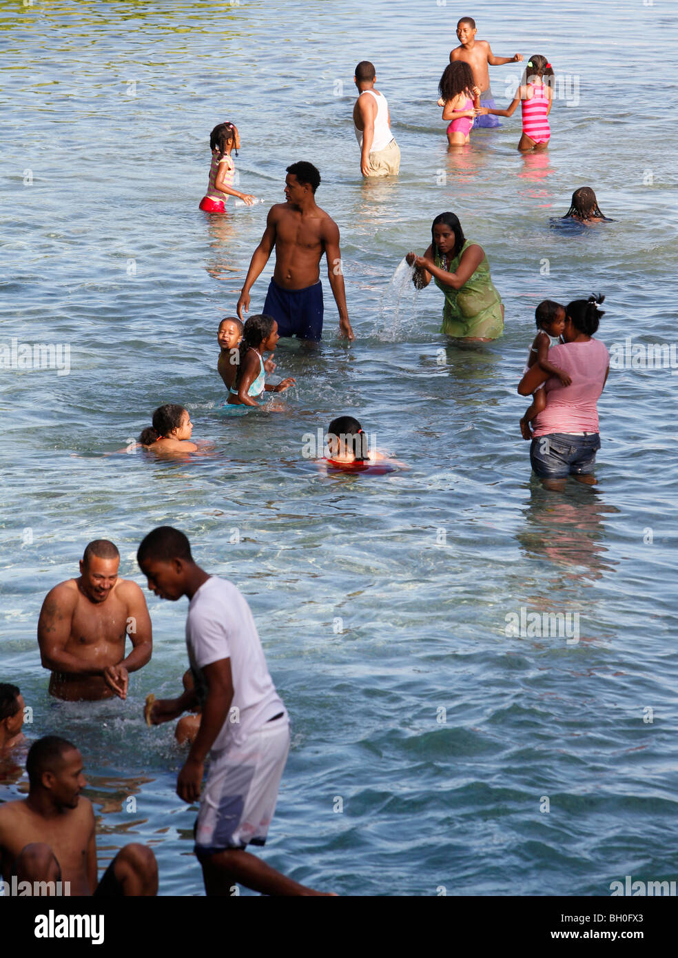 People swimming, Playa San Rafael, Dominican Republic Stock Photo