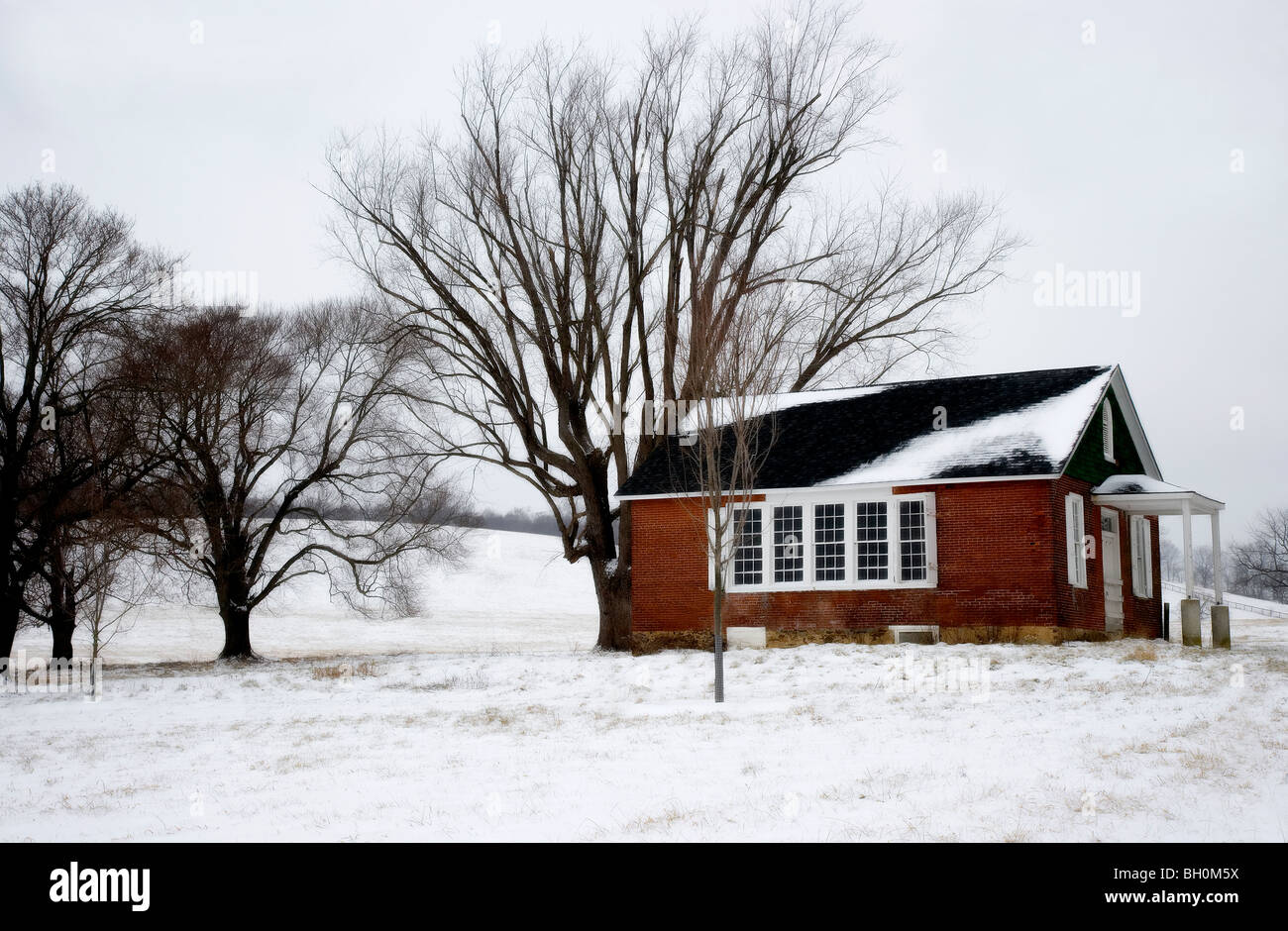 Historic One Room Schoolhouse,  Image taken during winter snow storm. Stock Photo