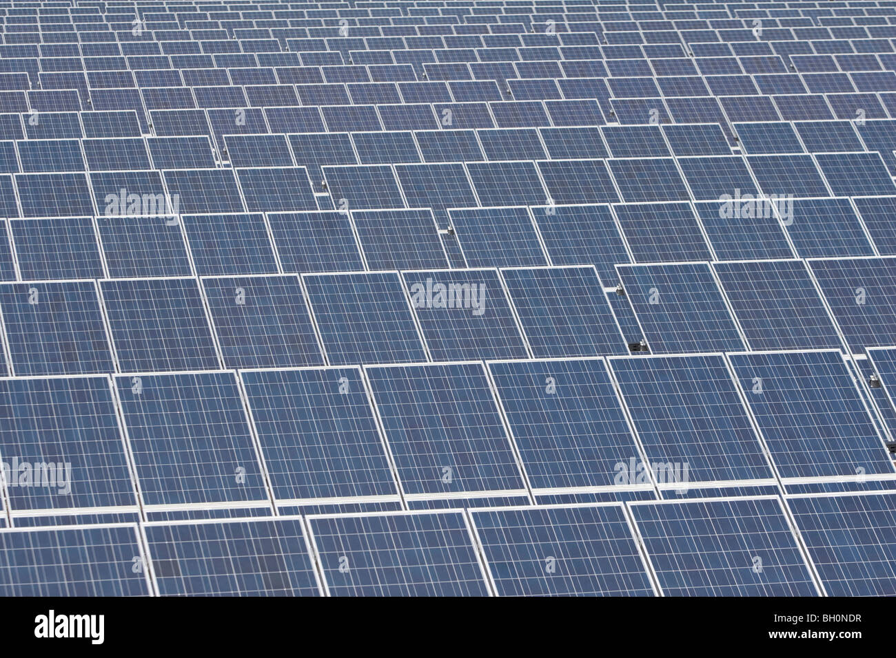 Solar panels used as part of a large scale renewable energy plant, Apulia, Italy Stock Photo