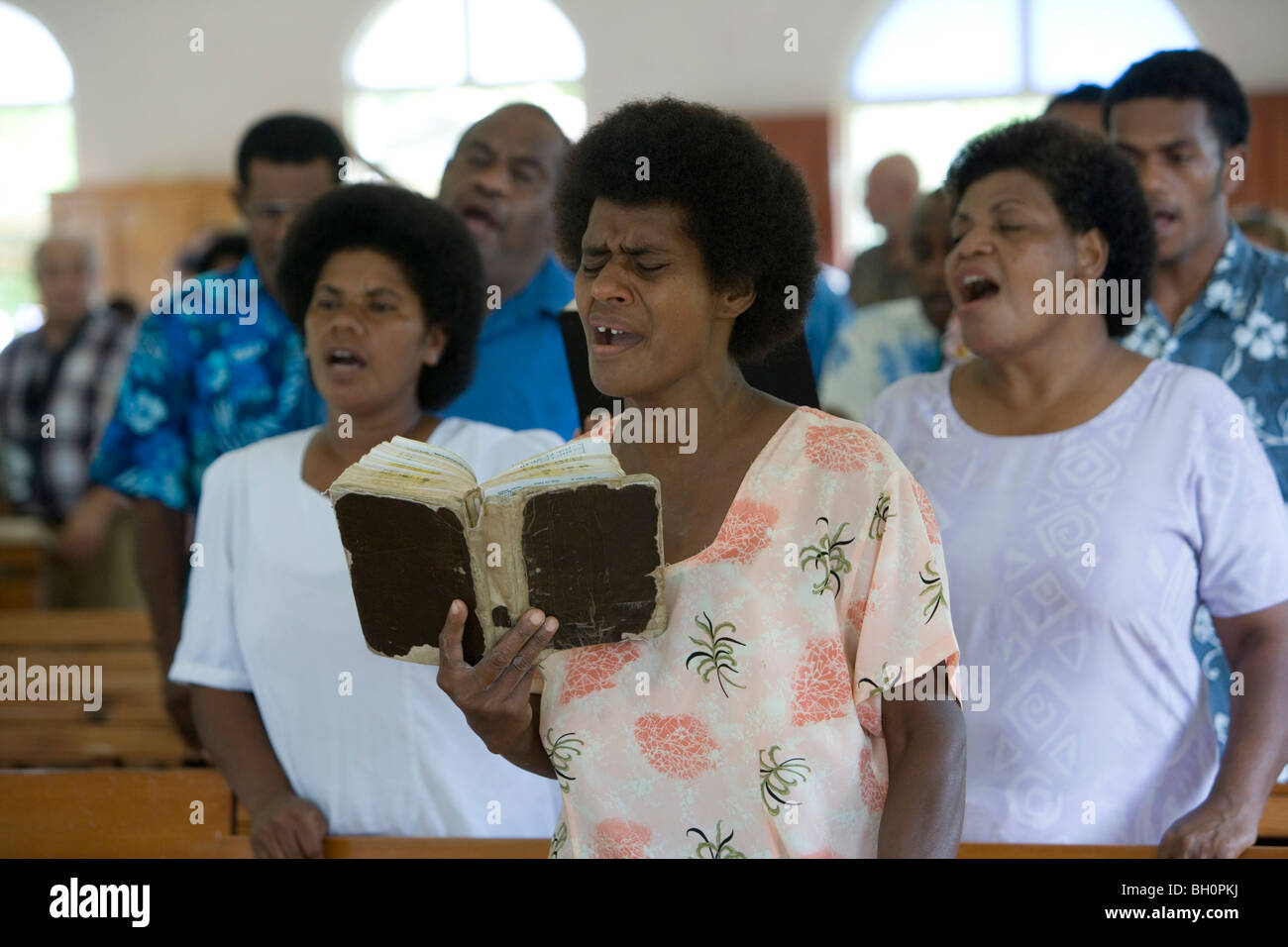 People singing at church service at the village Naidi, Vanua Levu, Fiji Islands, South Pacific, Oceania Stock Photo