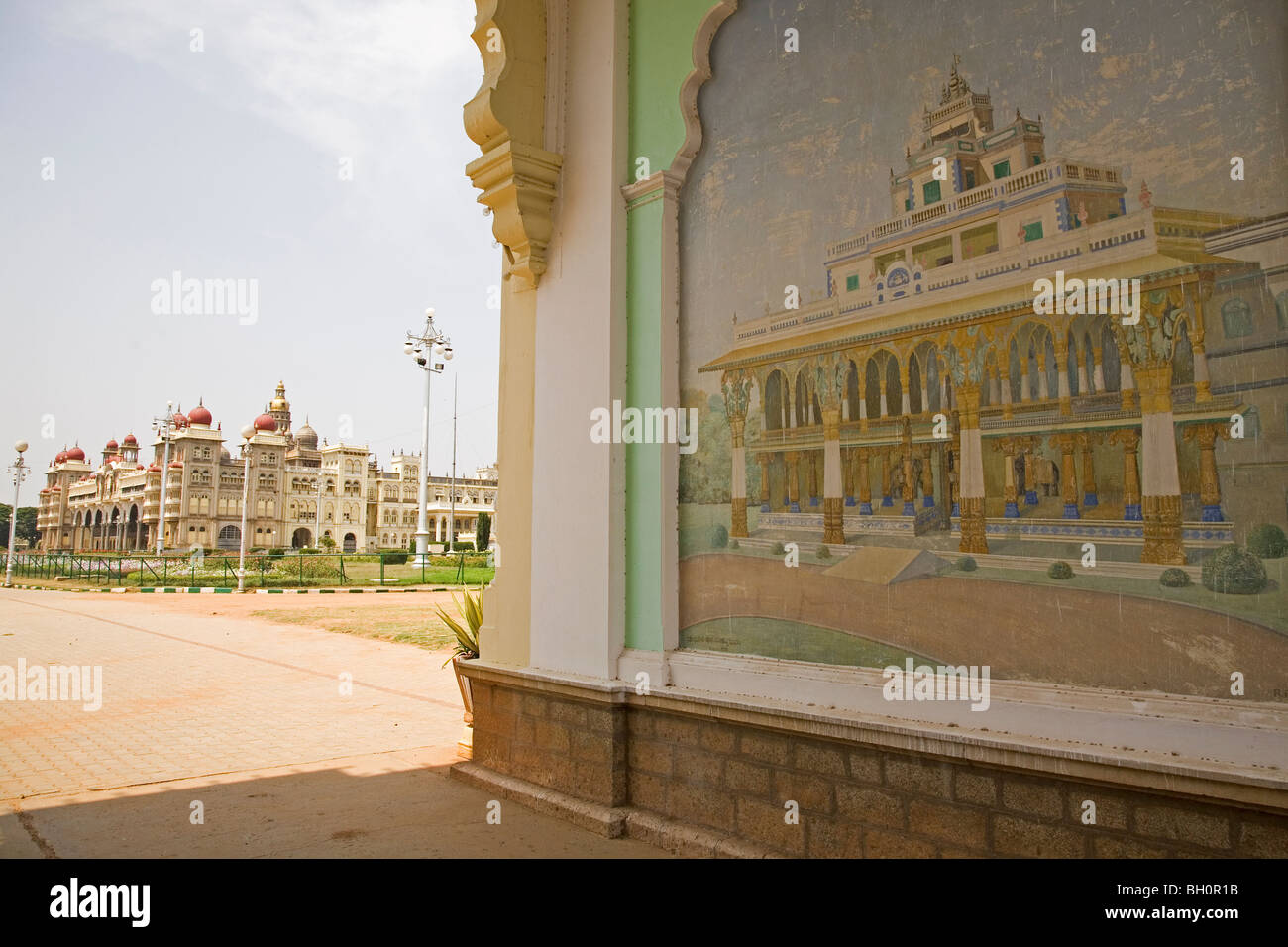 A fresco shows a royal palace in one of the gateways of the Indo-Saracenic Amba Vilas Palace in Mysore, India Stock Photo