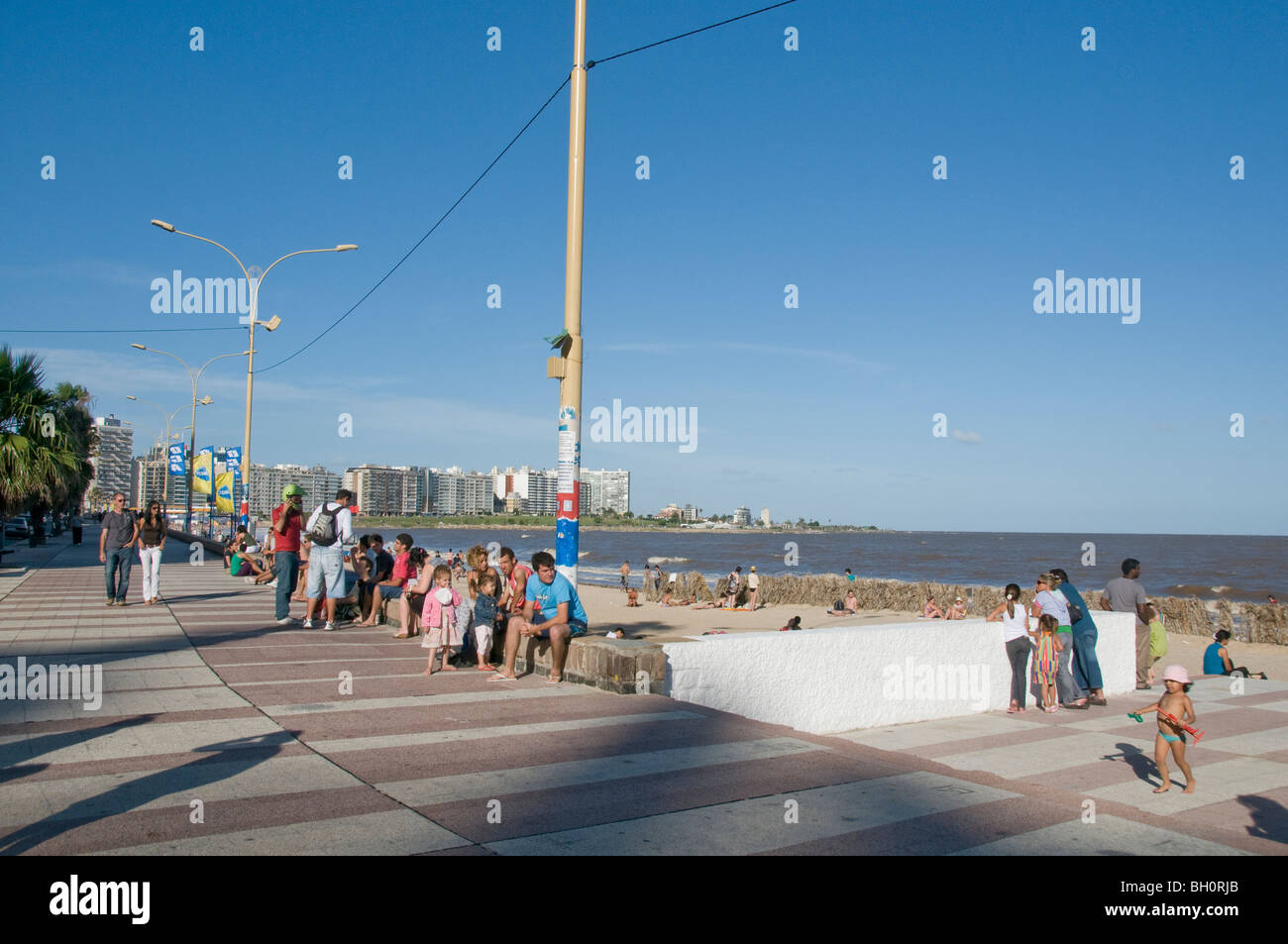 Uruguay. People sunbathing at Pocitos beach in Montevideo, Stock Photo