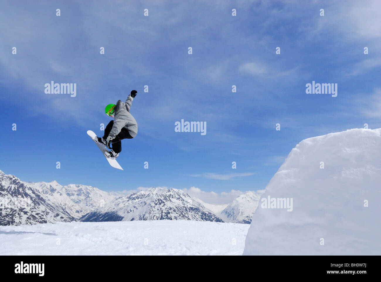 Snowboarder jumping from a kicker, ski area Soelden, Oetztal, Tyrol, Austria Stock Photo