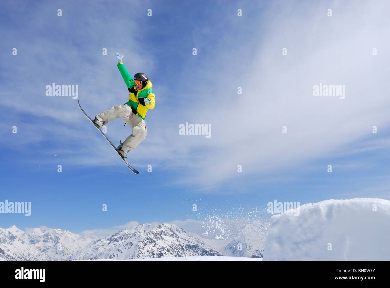 Snowboarder in mid-air, ski area Soelden, Oetztal, Tyrol, Austria Stock Photo