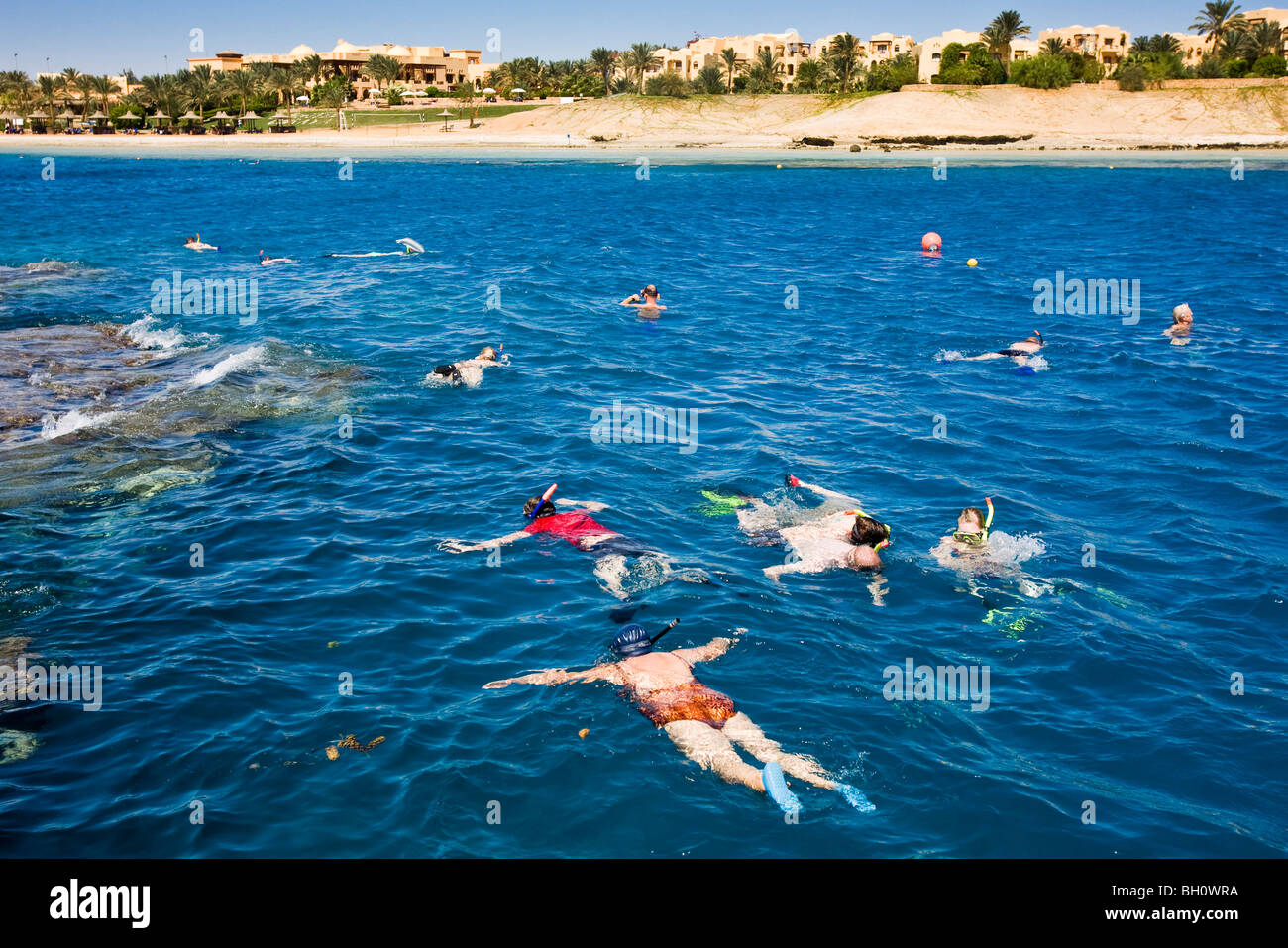People snorkeling at the Lamaya Resort coral reef, Coraya, Marsa Stock