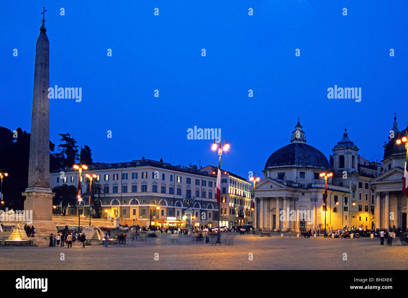 Rome- Piazza del Popolo by night showing the twin Santa Maria Churches and the 1200BC Ramases II Monolith Stock Photo