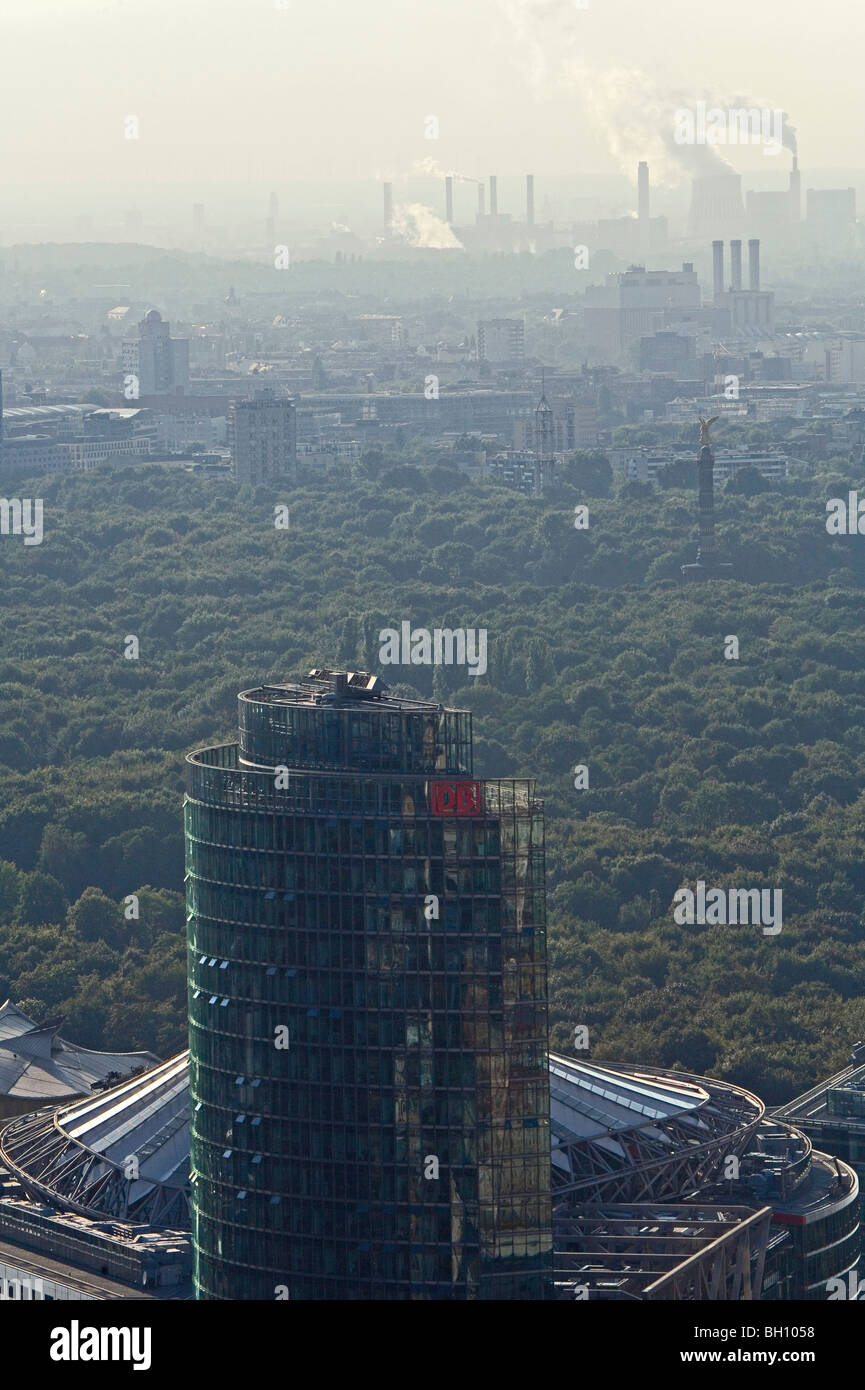View at DB Tower and smoking chimney stacks, Berlin, Germany, Europe Stock Photo