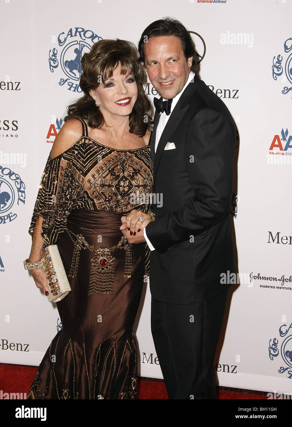 JOAN COLLINS PERCY GIBSON ACTRESS & HUSBAND BEVERLY HILLS CA USA 25/10