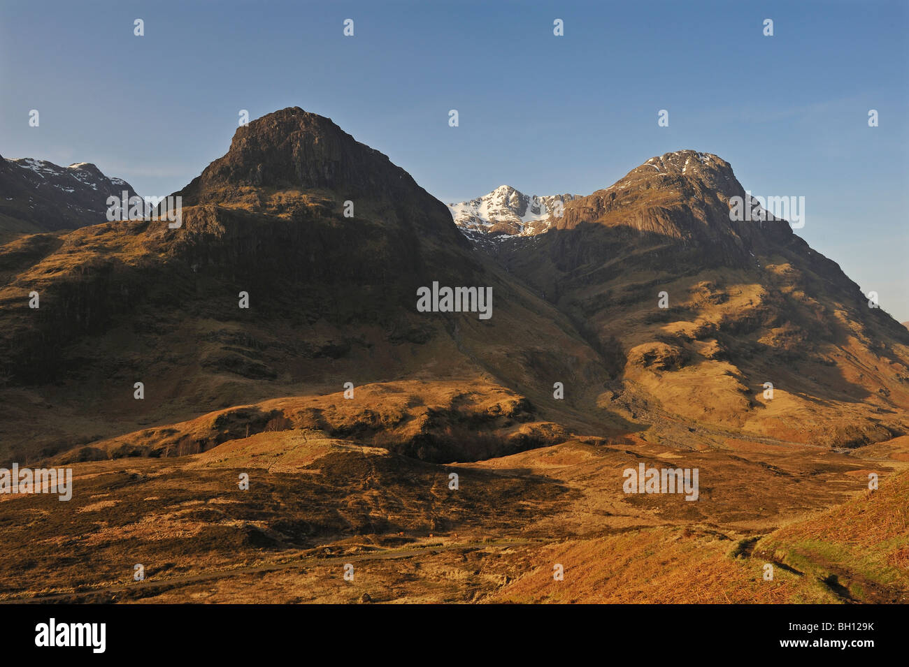 The Glencoe hills in early spring with snow on the highest tops, Glencoe, Argyll, Scottish Highlands, UK. Stock Photo