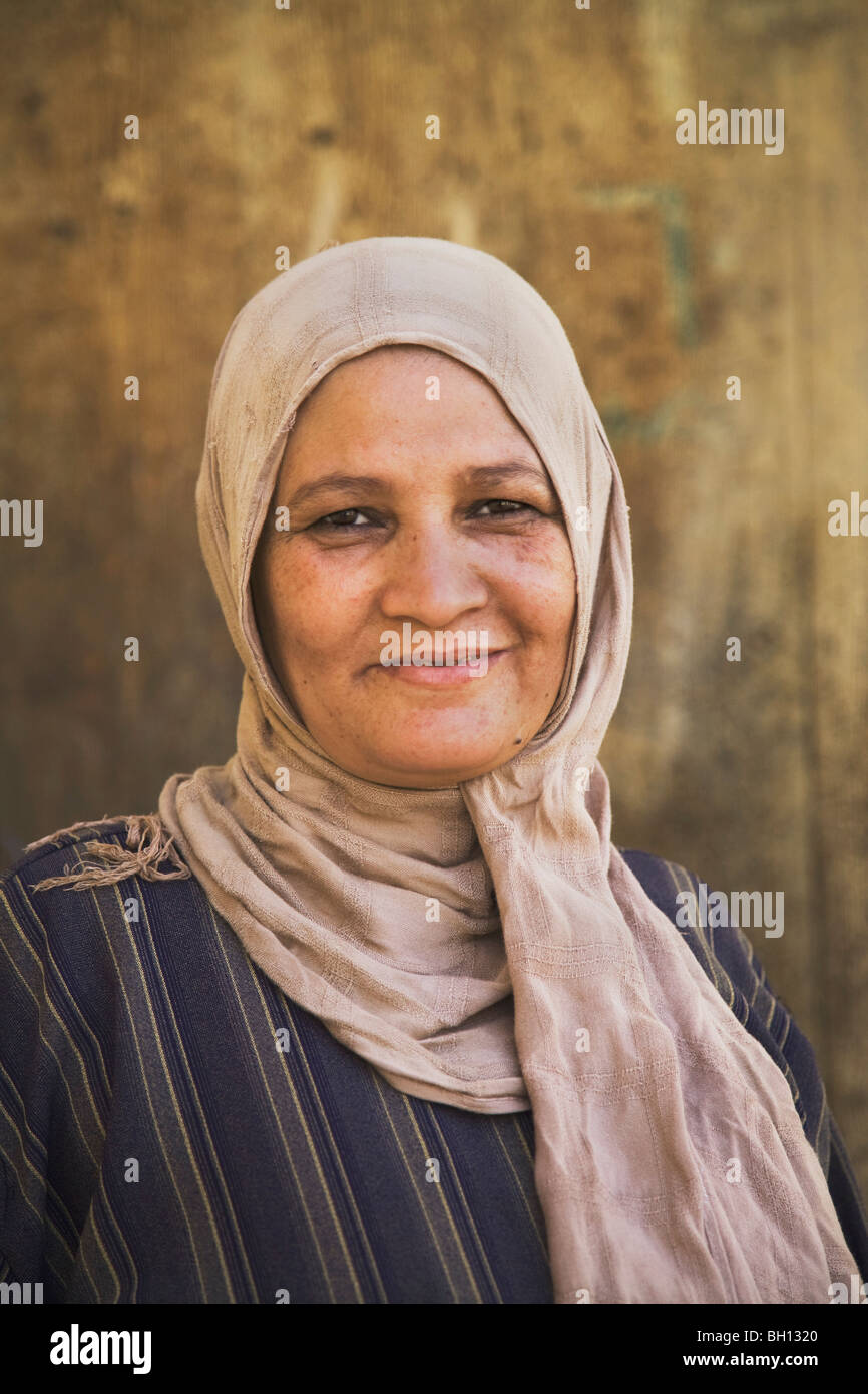 Egyptian woman dressed in traditional clothing, Luxor, Nile Valley