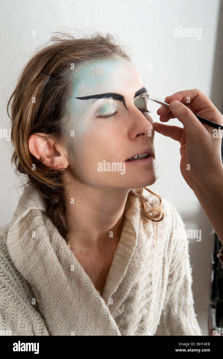 Make up session at a theatre before a performance Model release available Stock Photo