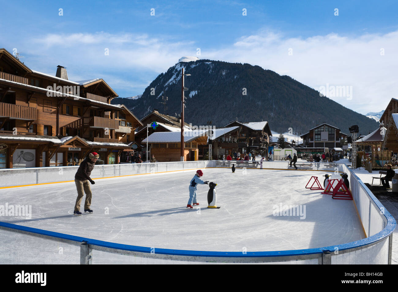 Skating rink in the centre of the resort of Morzine, Portes du Soleil Ski Region, Haute Savoie, France Stock Photo